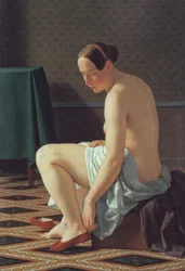 Young Woman Putting on Her Slippers